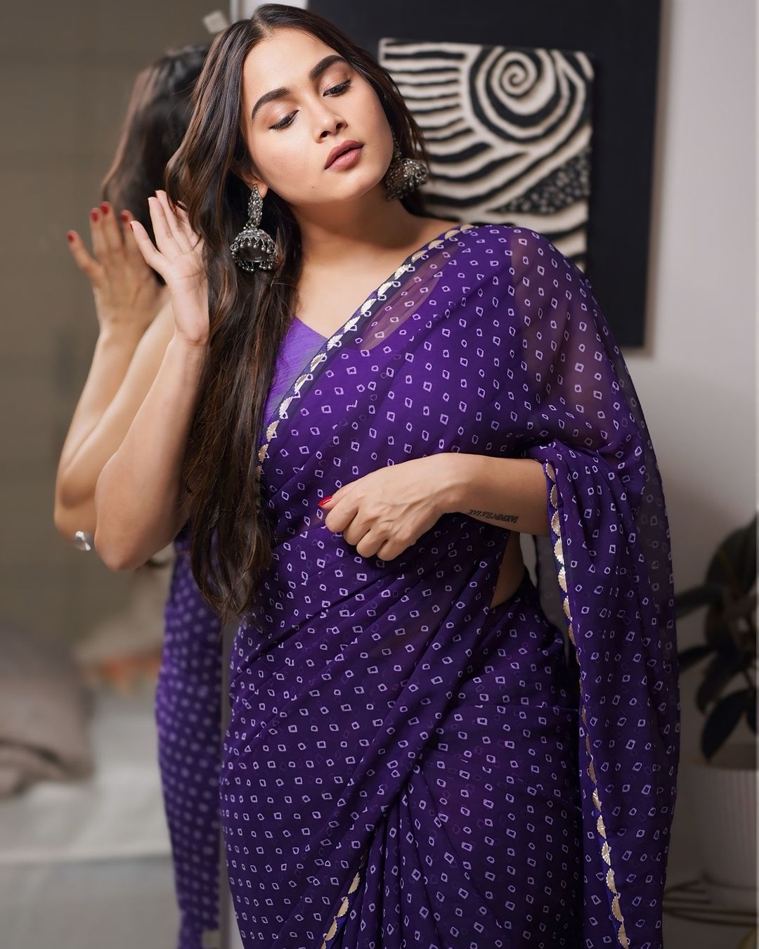 Elevate your style with the timeless charm of Bandhini Saree purpul